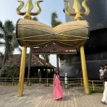 Golden Trishul arch gate at Maheswaram Shiva Temple