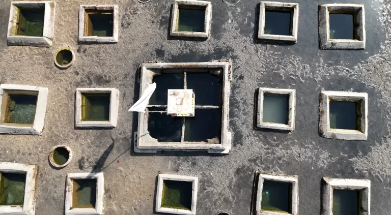Aerial view of Tuwa Hot Water Spring kund in Gujarat with multiple square water pools and central hot spring structure
